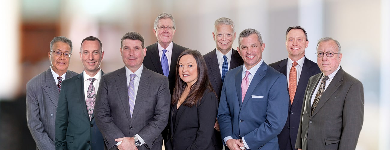 Hero Banner - Group picture of Silverman Thompson criminal defense team.
